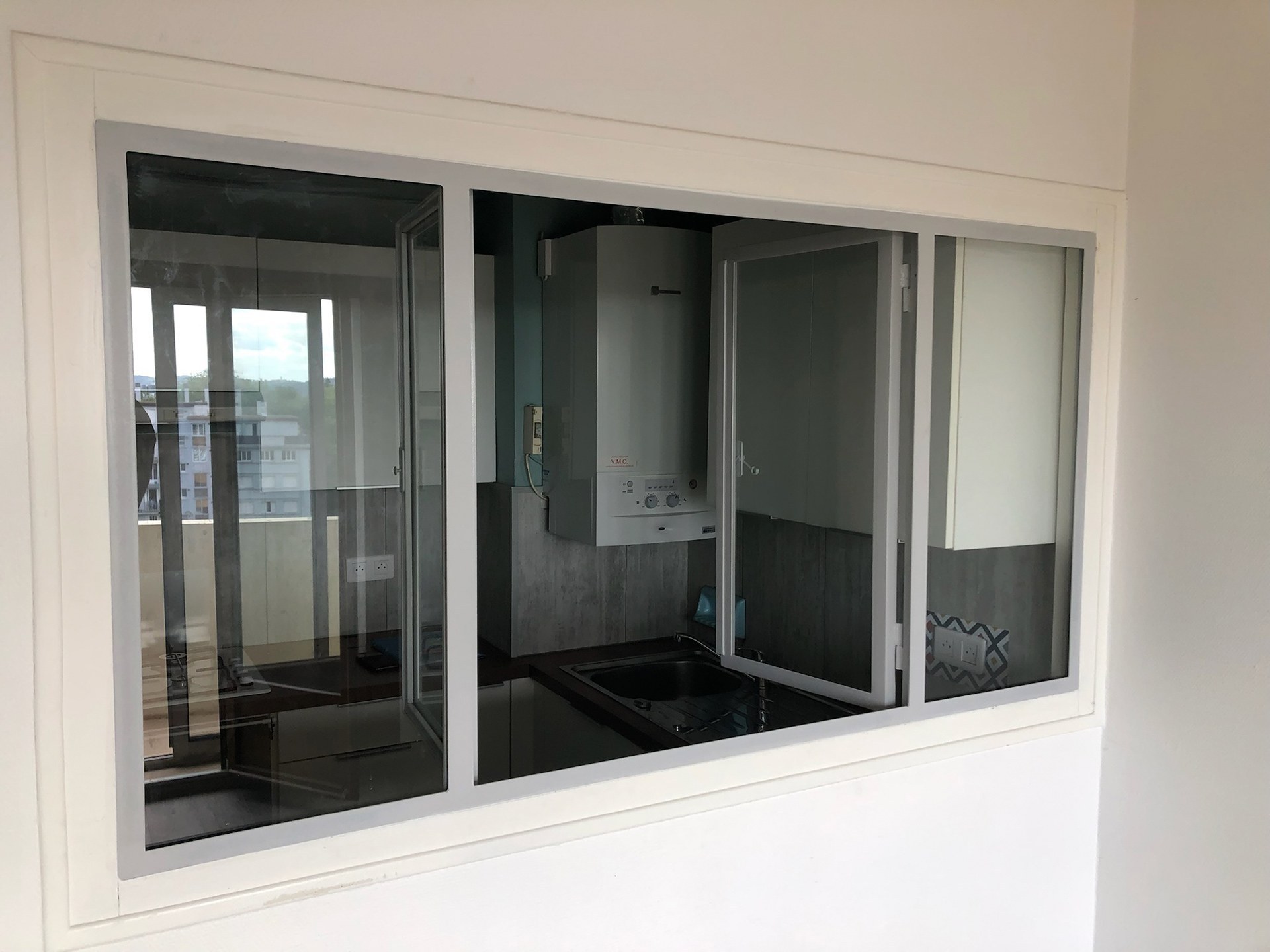 Verrière avec ouvrant intégré en acier